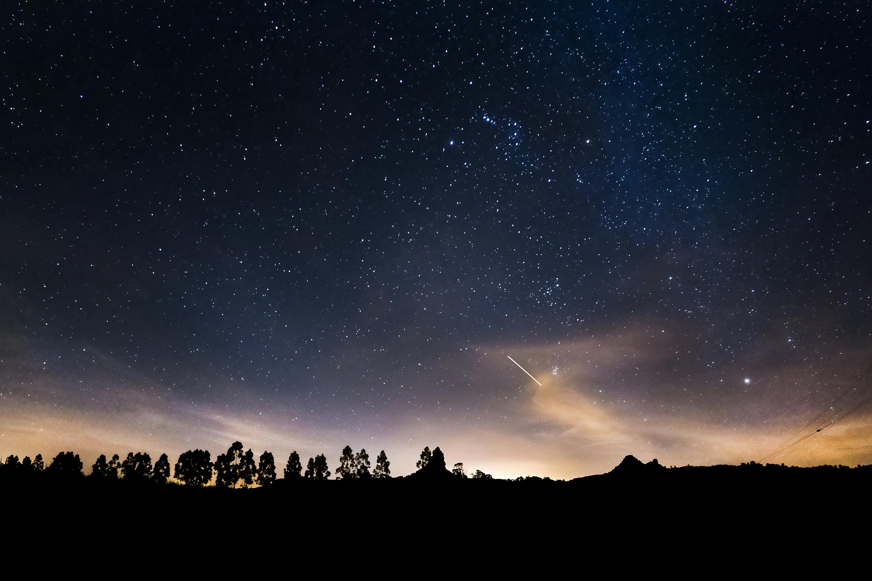 Night sky and stars representing the language of astrology